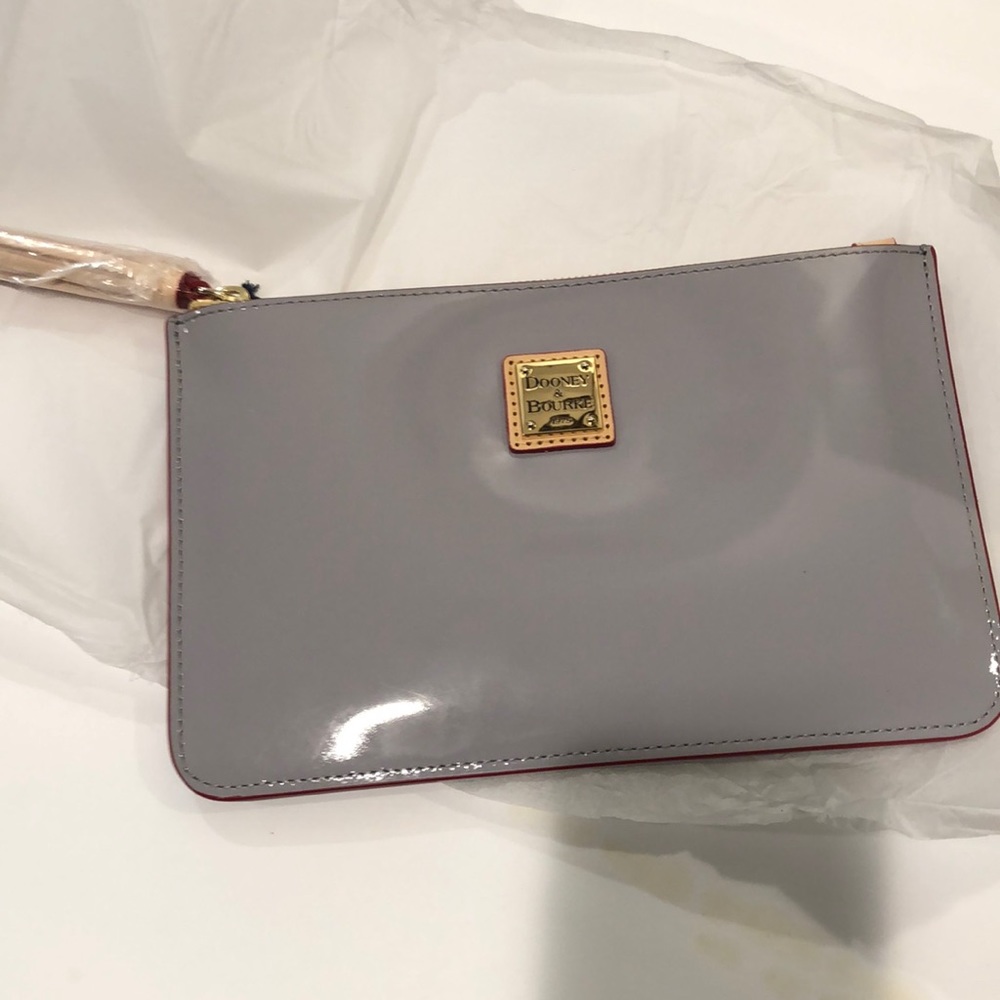 NWT Dooney & Bourke patent leather hand pouch